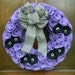 Purple Halloween Wreath - Felt Wreath with Purple Rosettes, Black Flower Eyes and a Black and White Striped Bow - 14 inch