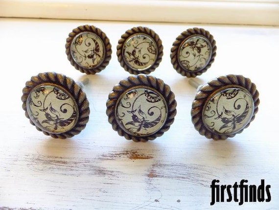 Whimsical Knobs Cream Background metal furniture by Firstfinds
