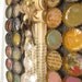 Bottle Cap Wall Hanging. Art from Upcycled Piano Rolls and Boxes