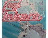 The Last Unicorn. 1980's fantasy movie based on the book. Anime. Cartoon animation. 80's video cassette.