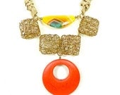 Chunky statement bib necklace in bright yellow, neon orange and gold, retro summer jewelry