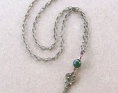 Ornate Bronze Treasure Key Necklace Dark Green Bead