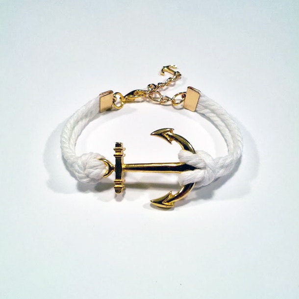 Matte white adjustable nautical rope bracelet with large gold anchor charm