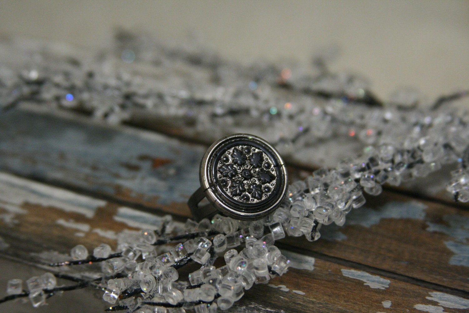 Glass Snowflake Ring - made with a vintage button on a gunmetal ring band