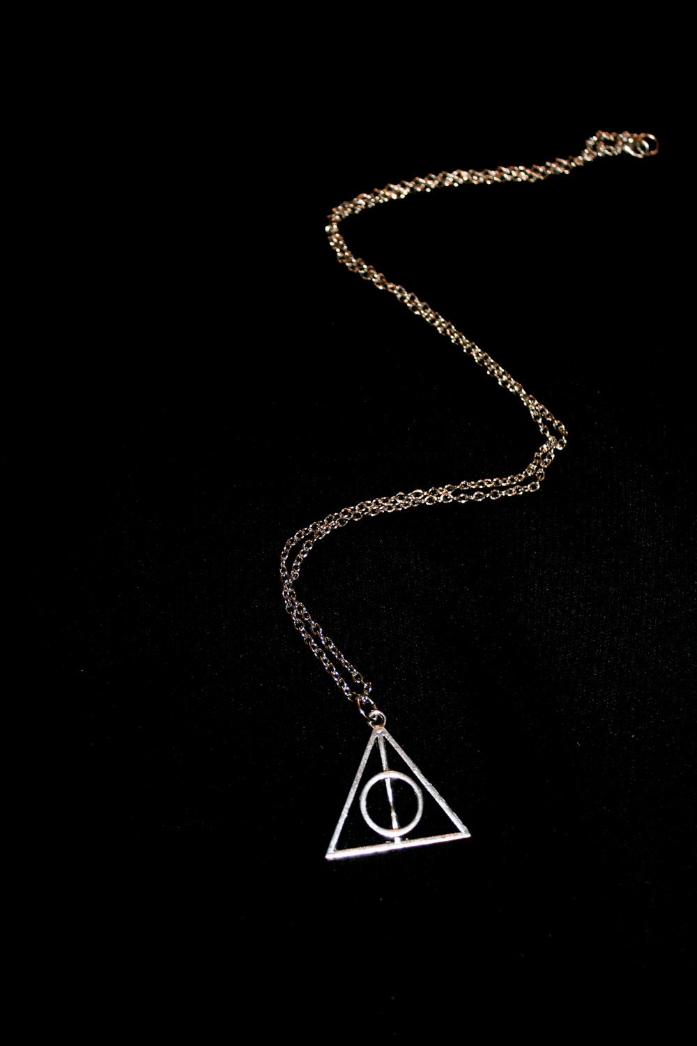 The Deathly Hallows Charm Necklace in Silver