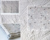 organic cotton baby quilt - tiny triangles in pale grey, white, blue and turquoise - made to order
