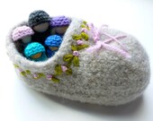 There was an old women felted wool shoe peg dolls