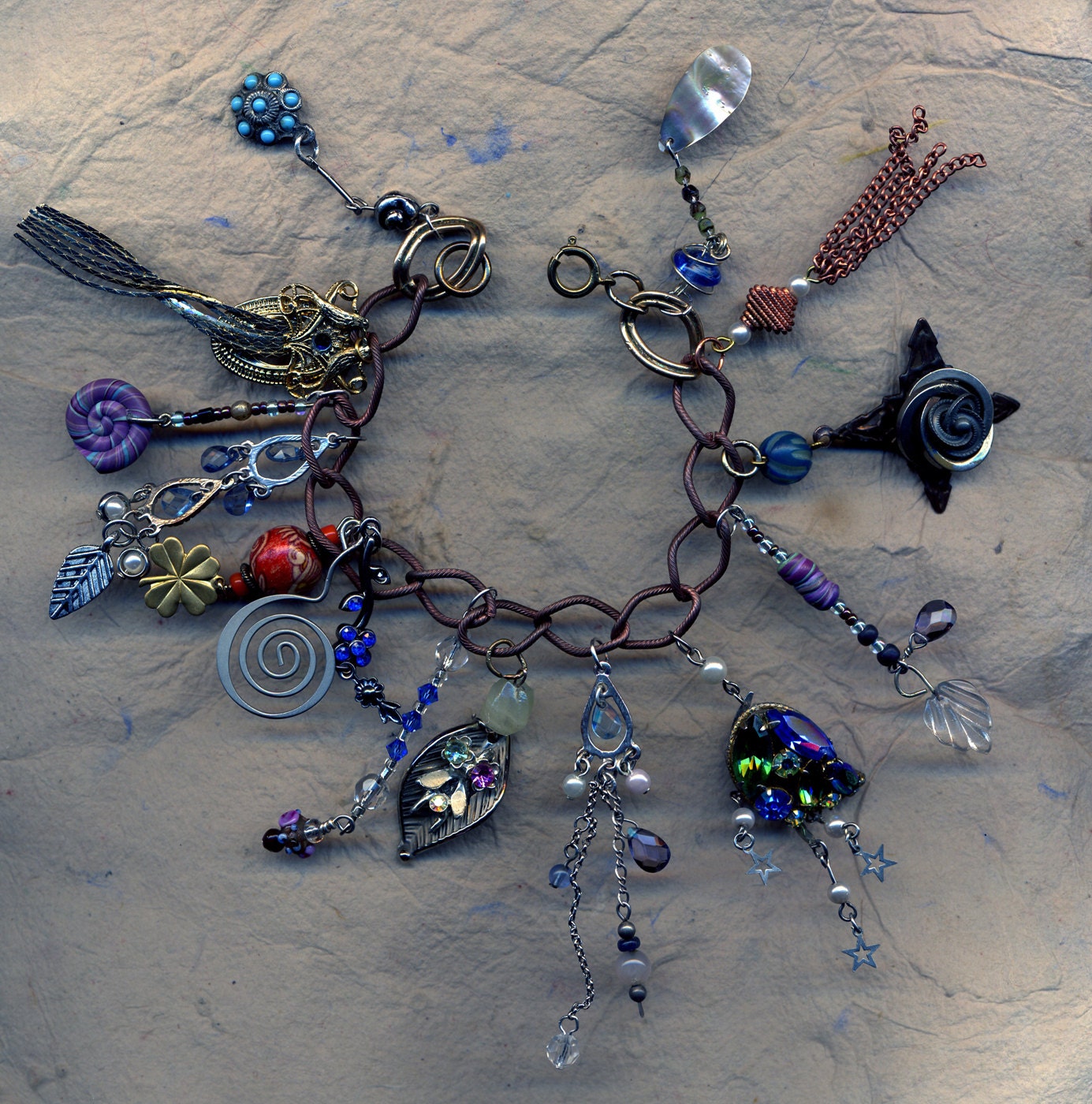 Delightful Dangles ...a charm bracelet of floral charms..all handmade