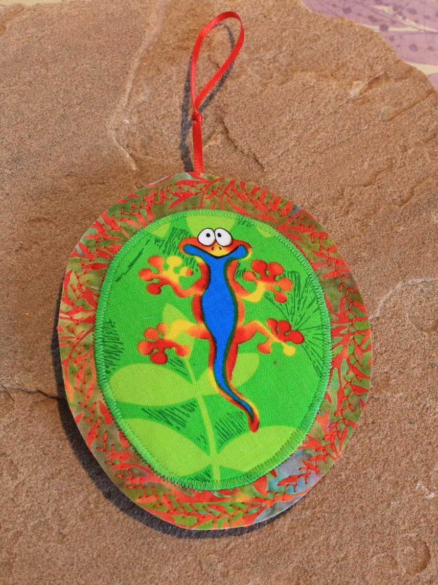 Catnip Toy Is A Gecko Lizard In Bright Blue With Red And Green