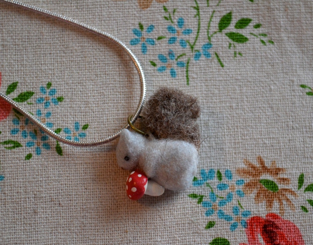 miniature brown squirrel pendant with mushroom