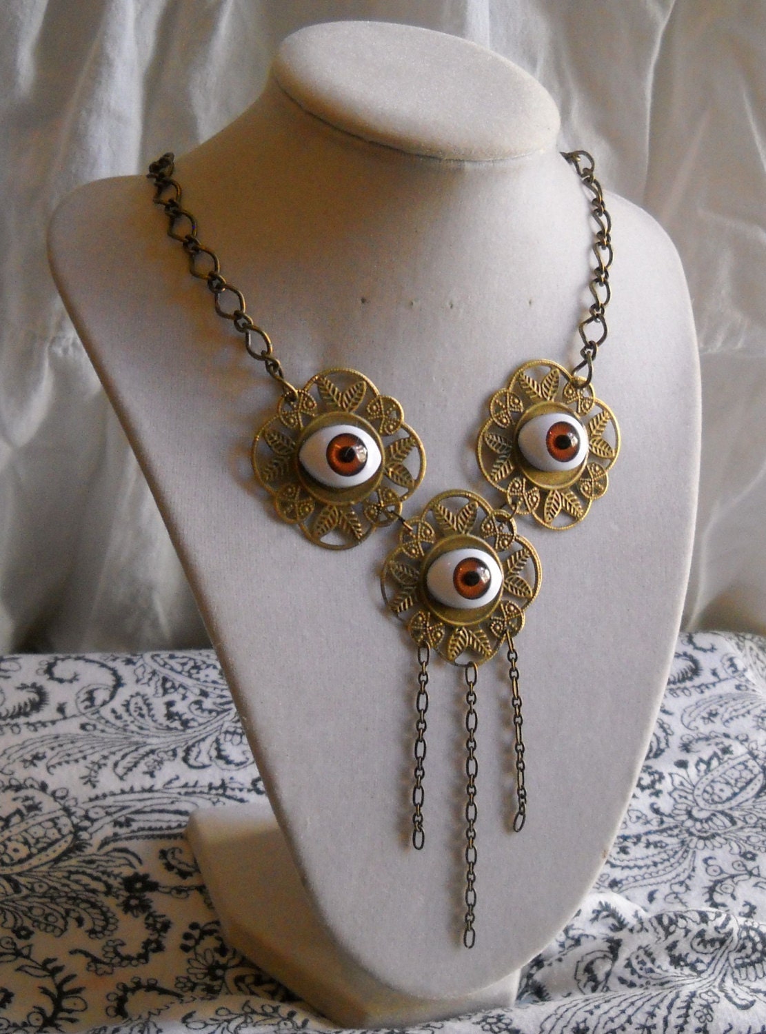 Creepy Brown Doll Eyes Filigree Necklace
