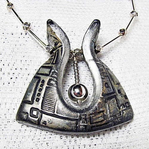 Bits and Pieces Pendulum Pendant