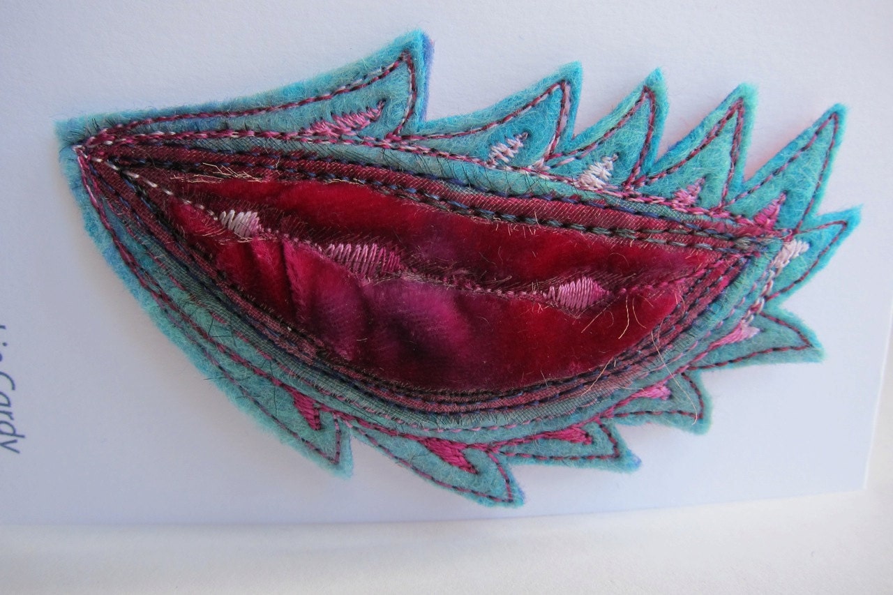 Gorgeous felt flame leaf brooch.