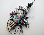 Under A Microscope recycled found object sculpture