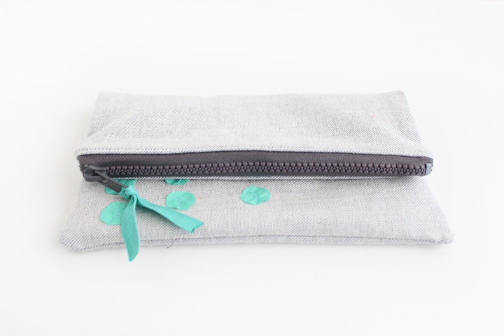 Light grey with mint fold over small clutch