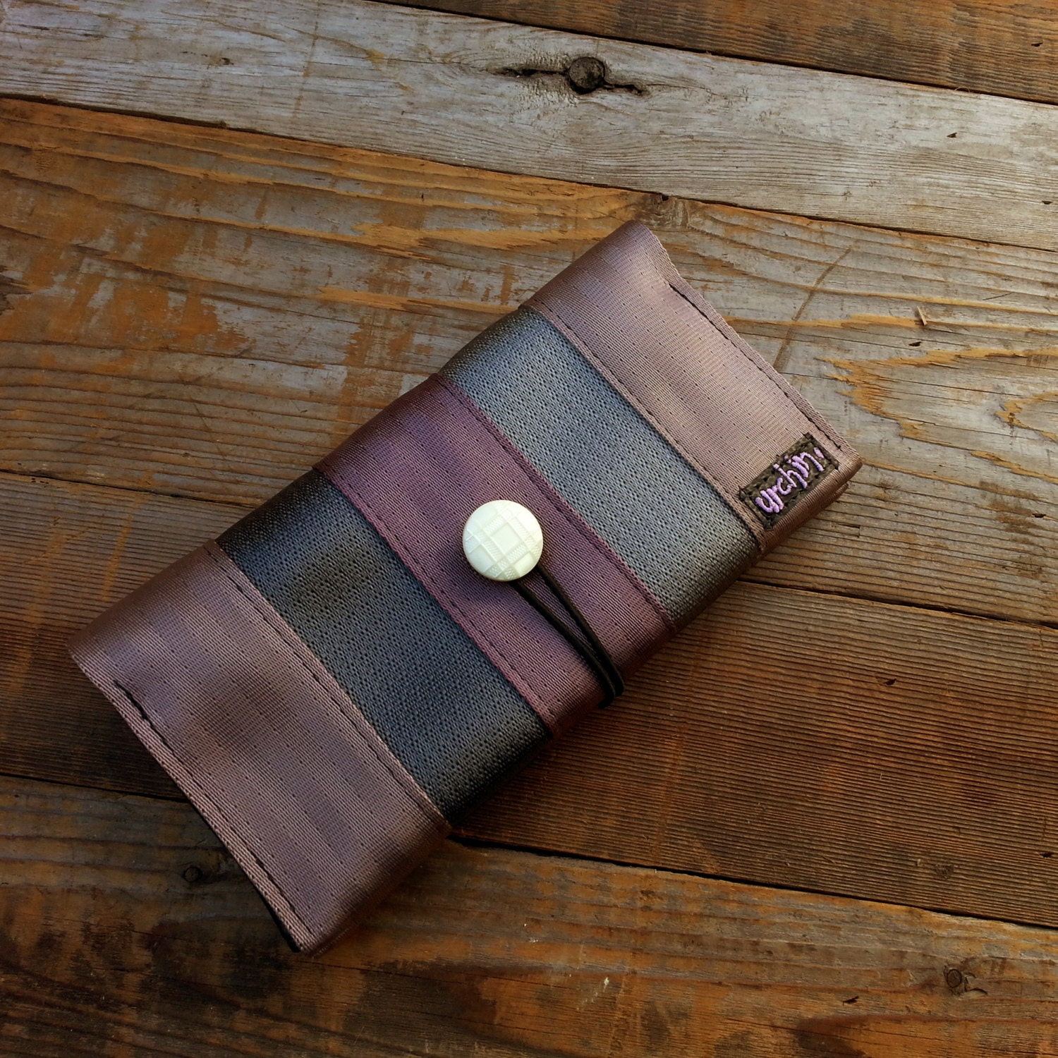 Eco friendly ladies wallet made from reclaimed seat belts and bicycle inner tube