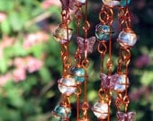 Iridescent Teal and Pink Suncatcher with Copper Wrapped Glass Marble Prisms and Amethyst Glass Butterflies