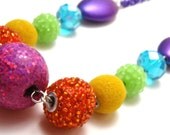Chunky Rainbow Necklace - Thick colorful kandi beaded statement necklace with glittery hot pink focal bead and purple chain - Kandi Raver
