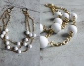 vintage. white beaded. triple strand. bridal. mad men. 1960s. necklace. costume. gold.