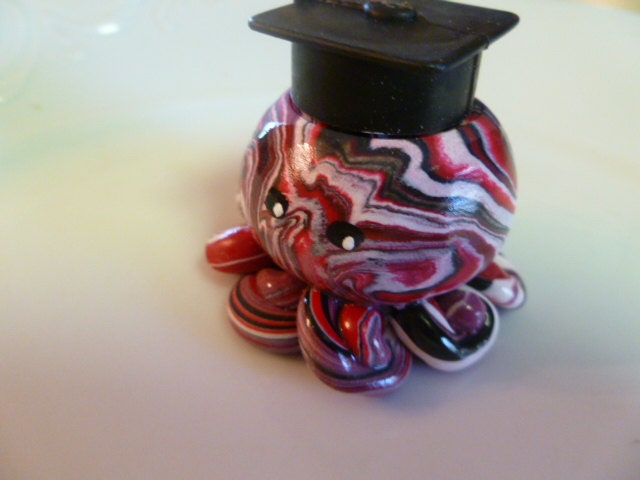 Graduate Octopus Mini Marble Friend with Cap in Your School Colors shown here in Red Black and White