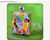 Moving Sale - FACETS : a jewelry pendant charm made from a Scrabble Game Tile game piece