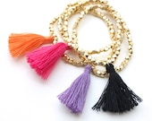 TenThings. GOLD ethnic. beaded. tassel. bracelet.