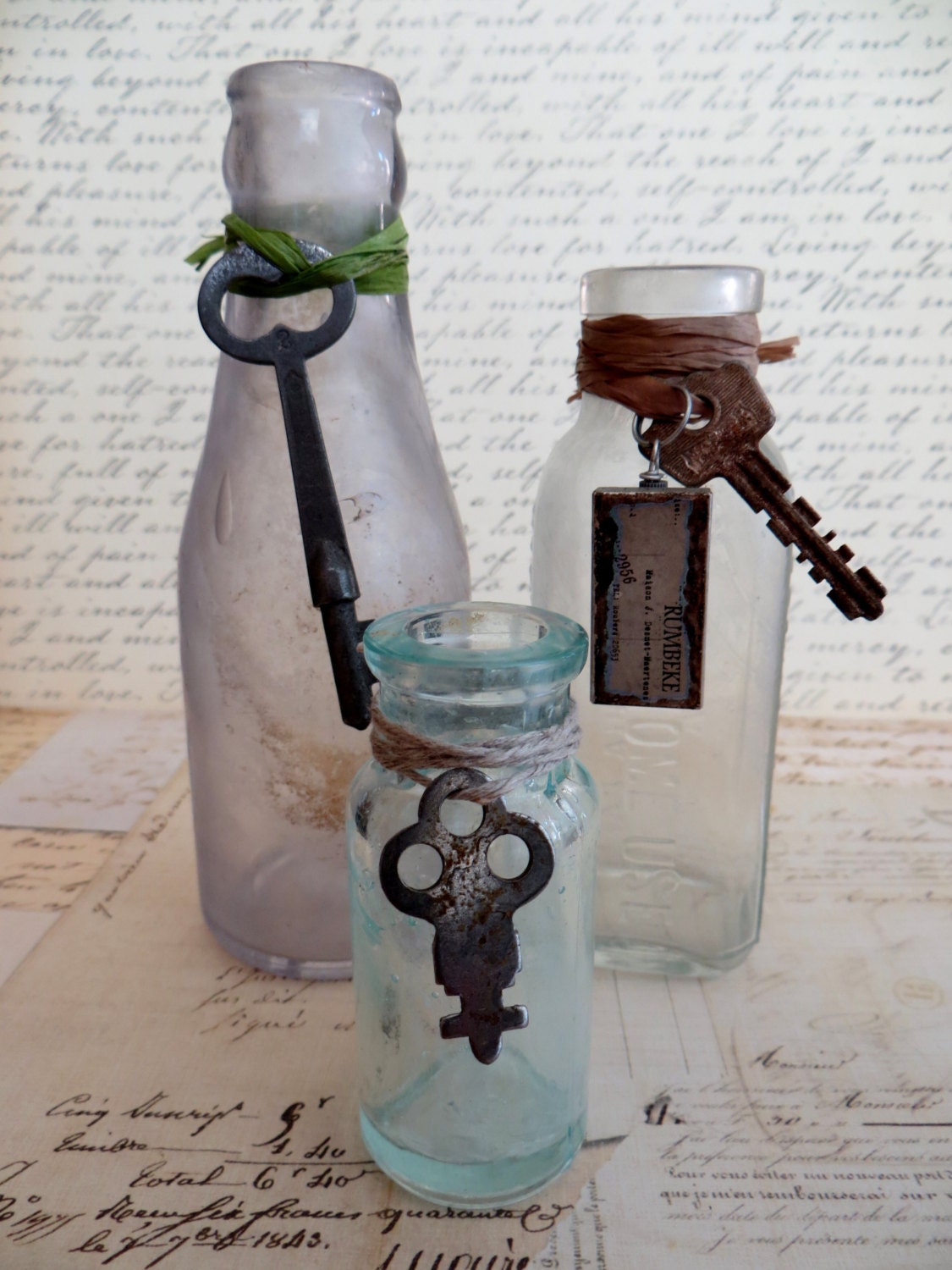 Three Antique Vintage Bottles With Skeleton Keys and Charm