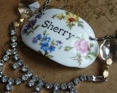 Sherry vintage staffordshire porcelain decanter label,  rhinestone necklace