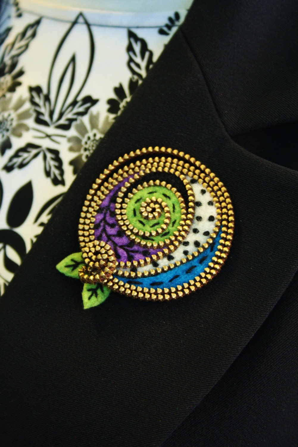 Multi colored abstract felt and zipper brooch