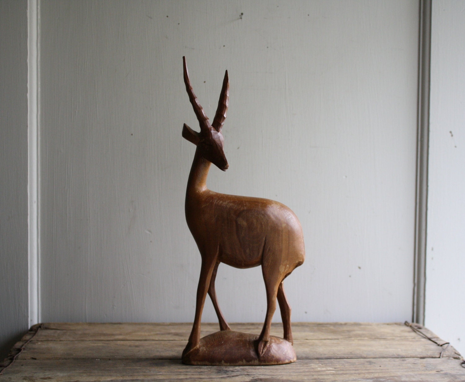 hand carved wooden antelope