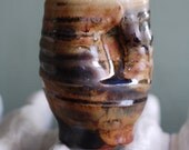 indented stoneware tumbler
