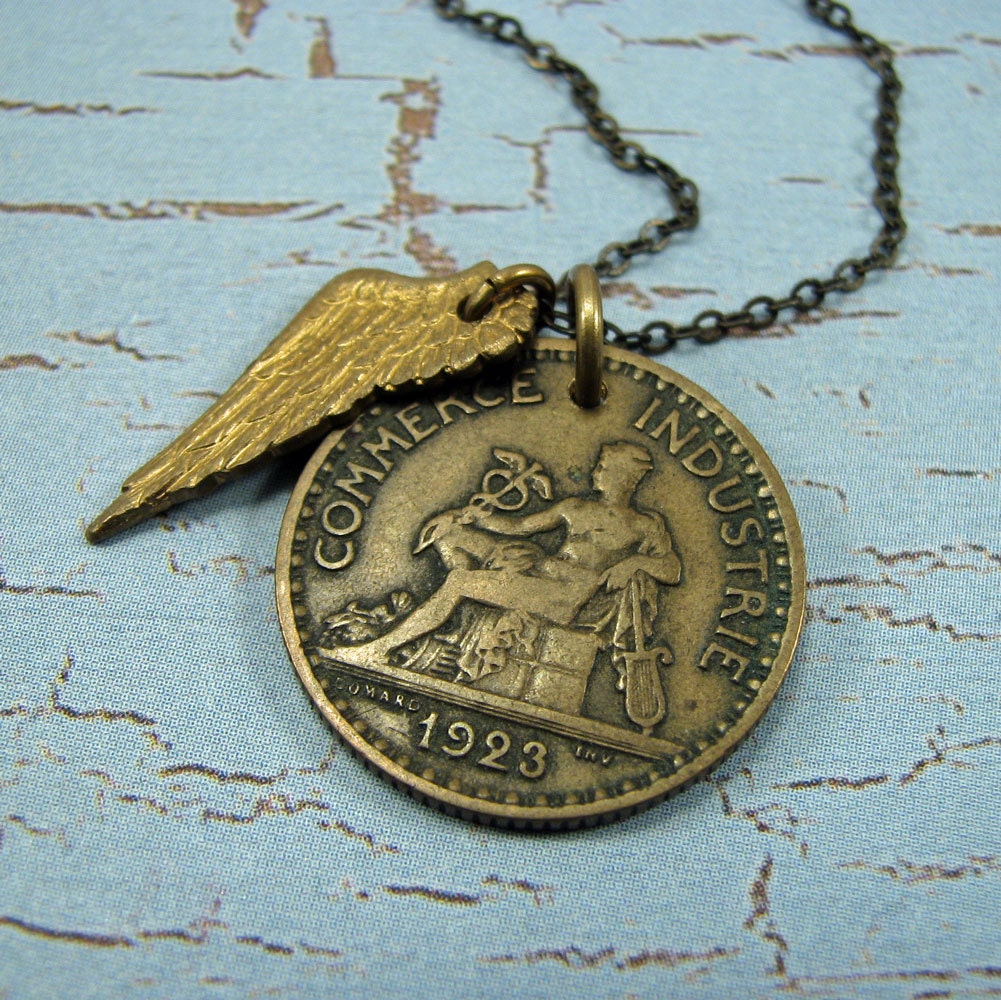 French franc coin necklace with wing charm