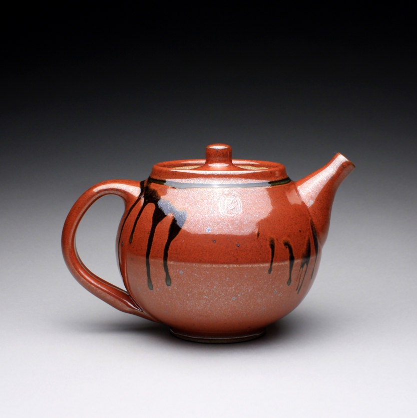 handmade ceramic teapot, tea kettle with iron red and green celadon glazes