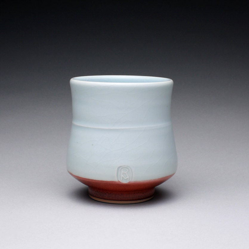 handmade porcelain cup, tumbler, teacup with turquoise celadon and bright copper red glazes