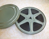 Homemade movie.. vintage film reel with film..industrial chic