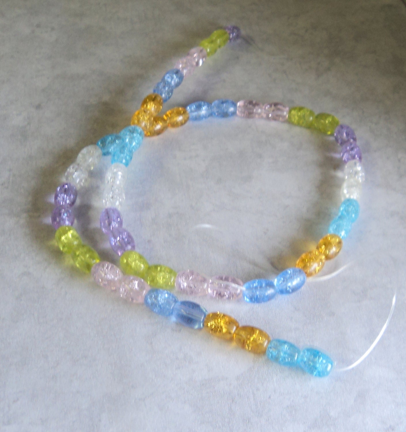 DESTASH SALE Beads Crackle Glass 7x6mm Oval  15 Inch Strand Pastel Multi Color