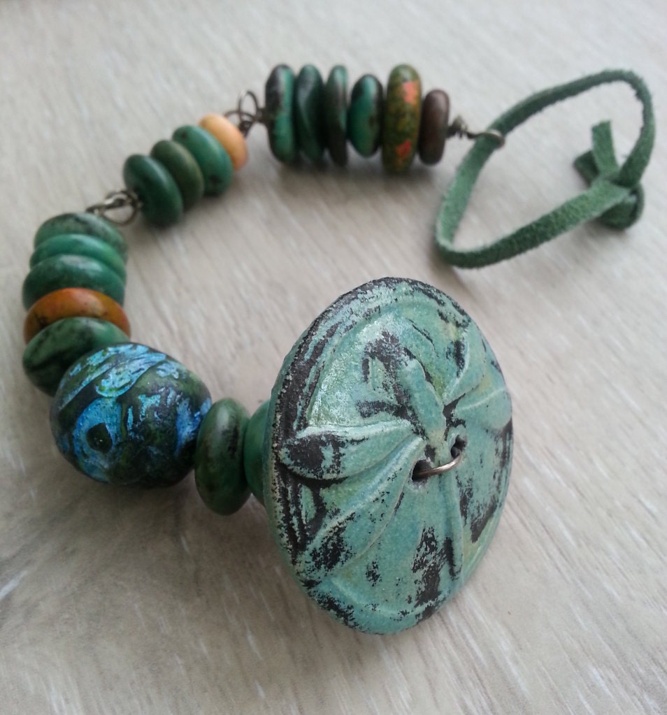 Dragonfly Dreams  bracelet with raku fired button  stone suede and polymer art bead