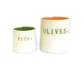olives and pits  ....  hand built porcelain containers ...  vessels