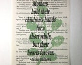 Mother print on a book page, Mother's hold their children's hands