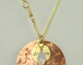 Dream, handmade, coppper disc, hammered and suspended with engraved "dream" charm and beads on neckchain