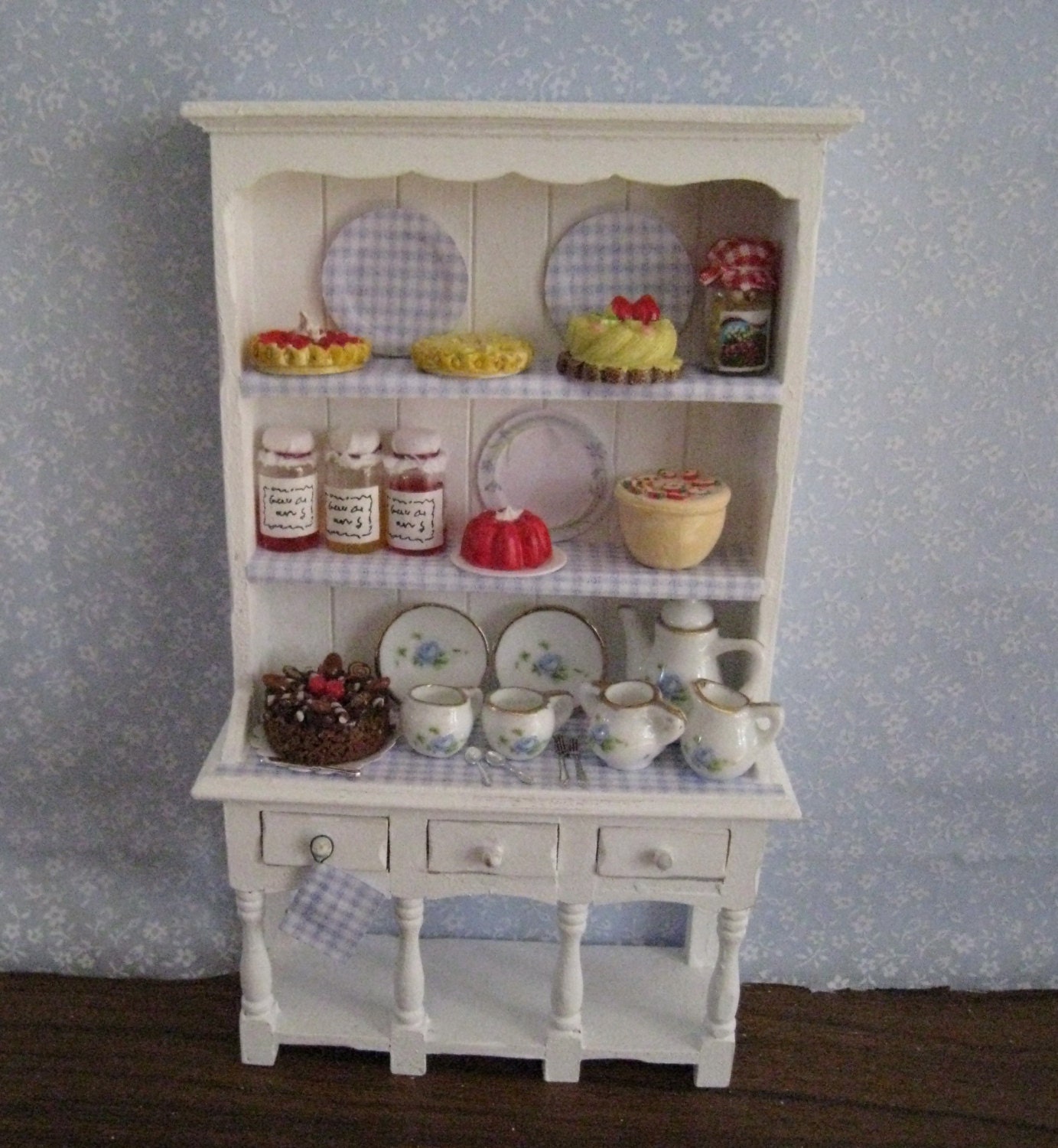 Filled Hutch,blue check.   Twelfh scale dollhouse miniature