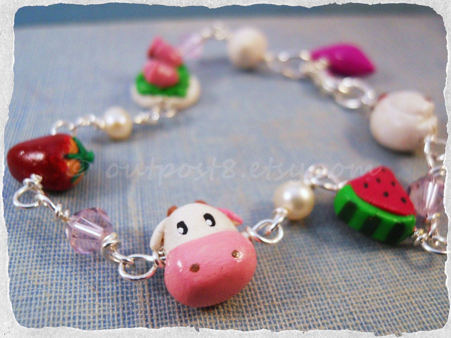 Harvest Moon inspired polymer clay charm bracelet. Girly gamer jewelry. Pink, red. Free US shipping.