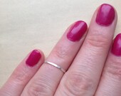 Sterling silver knuckle ring, above the knuckle ring, hammered silver