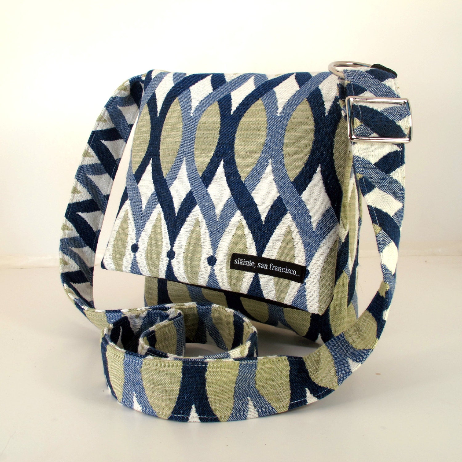 HIP BAG in white, blue, green Resort fabric. Adjustable Strap. Cross Body Bag. Washable. Black Nylon lining. Made in San Francisco.