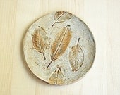 Magnolia leaf patterned flat plate