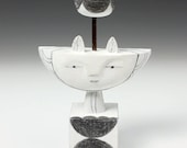 Springtime flower girl wooden sculpture