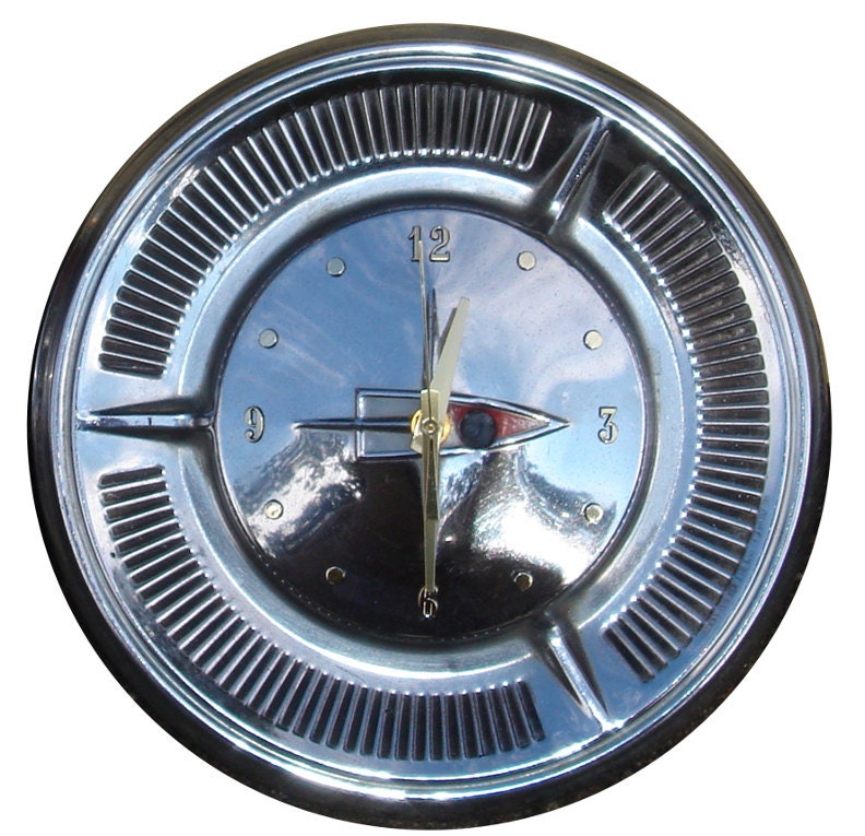 A "Bullet Hole" Hubcap Clock, with numbering (f classic car clock)