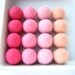 16 felted wool beads / balls (pink shades)