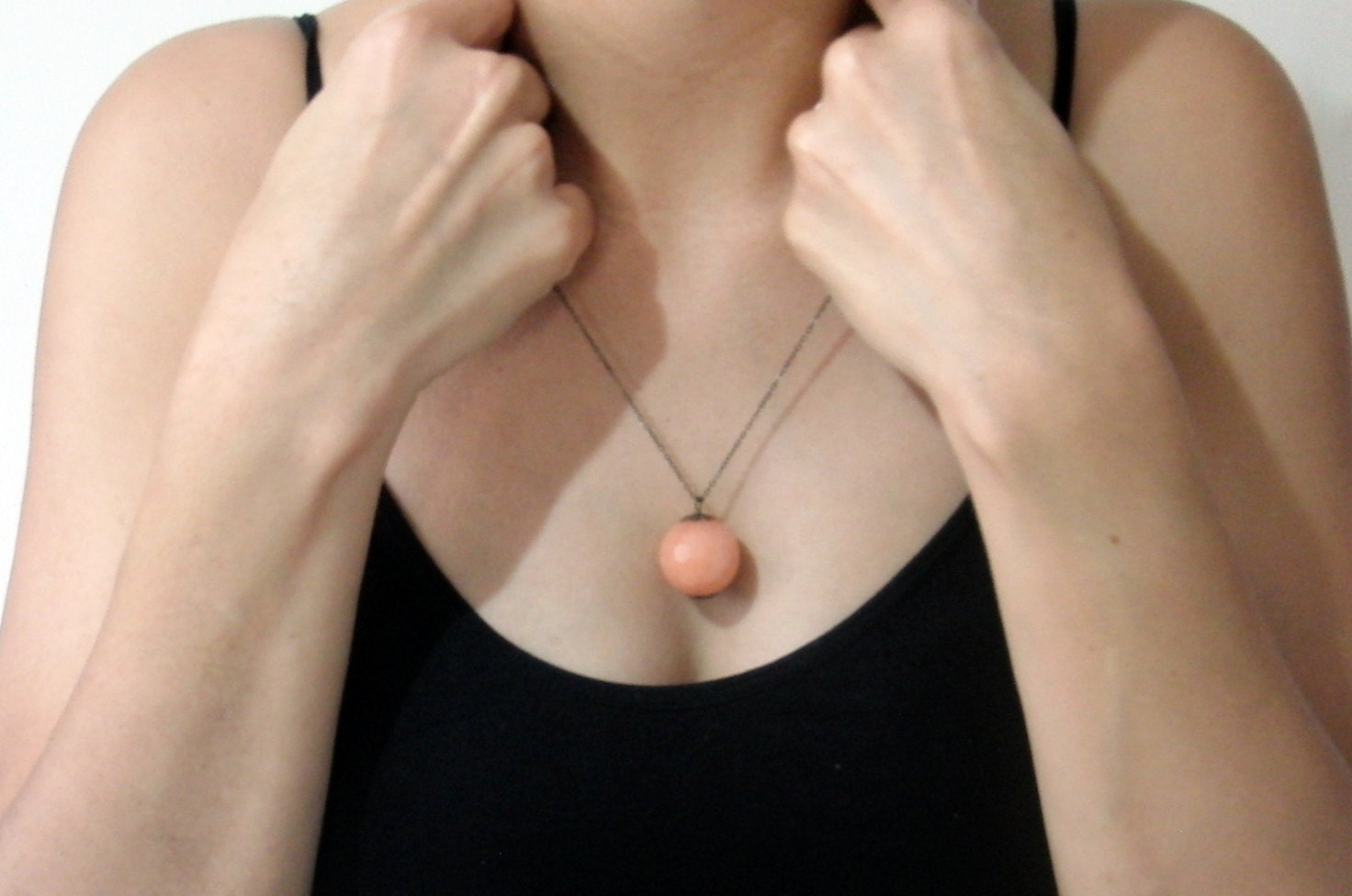 Long Copper Necklace With a Peachy Orange Stone Bead