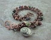 Rustic Beaded Charm bracelet with Ceramic Ammonite Charm